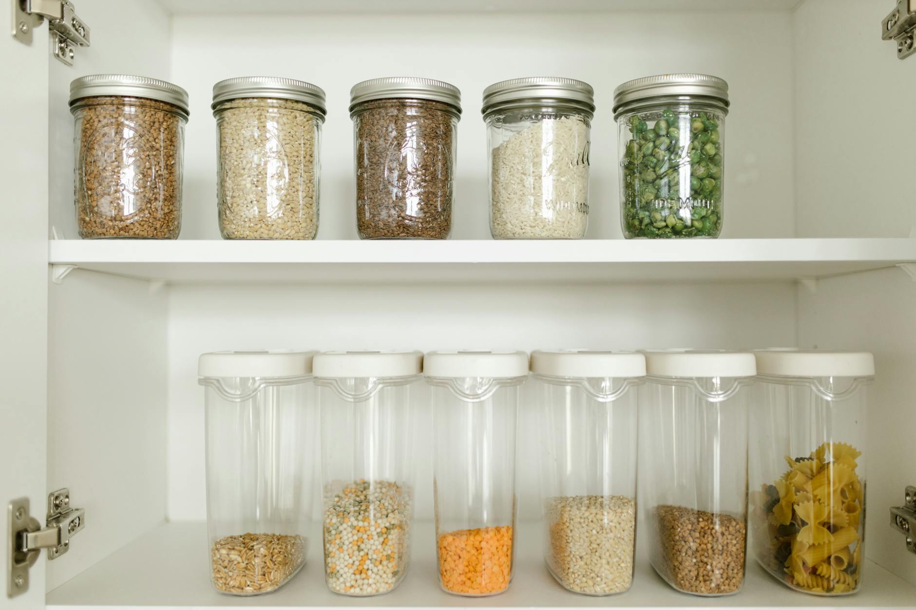 Organized kitchen pantry shelf with tea and spices