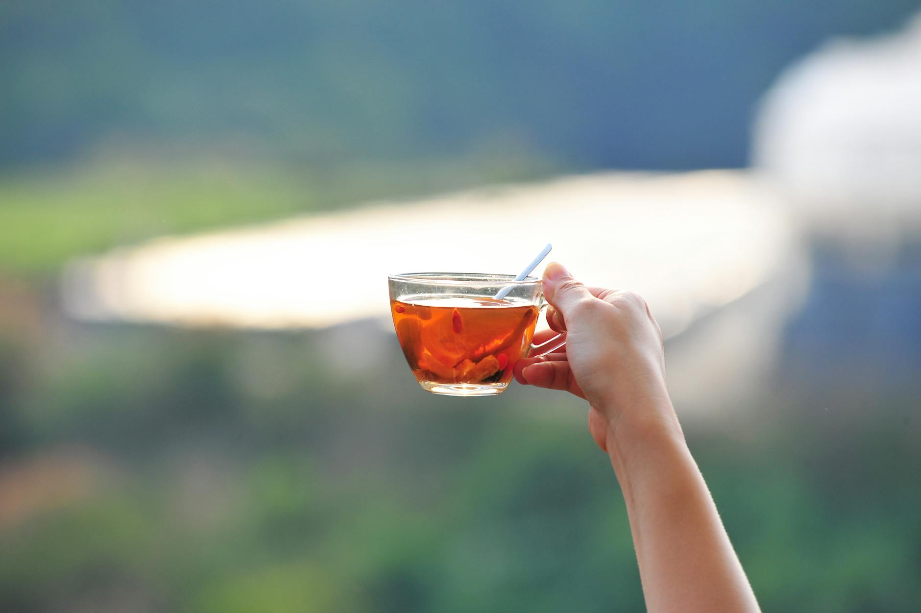 Woman relaxing with a warm cup of tea