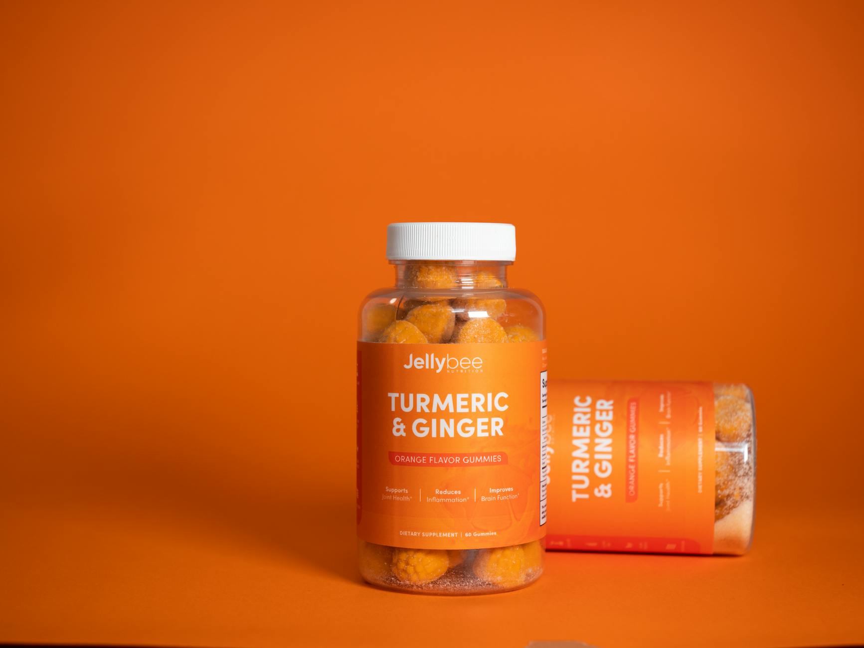 Turmeric, ginger, cinnamon and clove on a wooden board