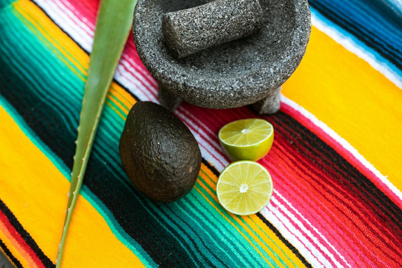 Whole spices being ground with a mortar and pestle