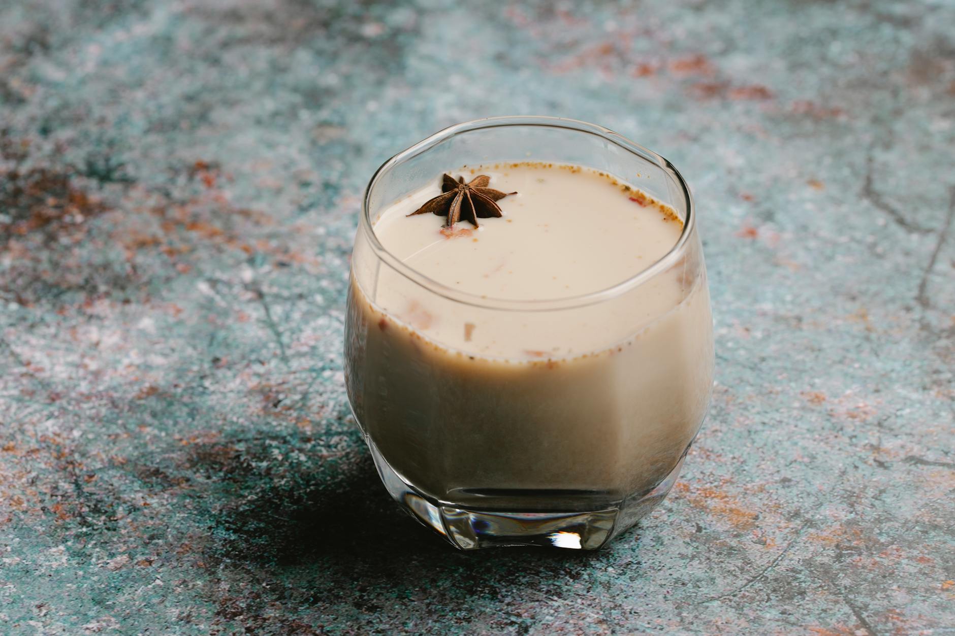 A finished dirty chai latte served in a café setting