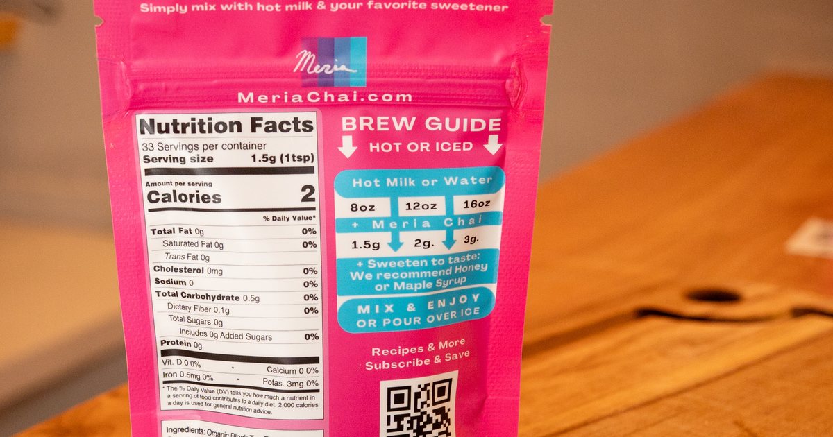 A clean unsweetened chai powder beside the back of a typical "sugar-free" mass-market chai box, with the ingredient list visible
