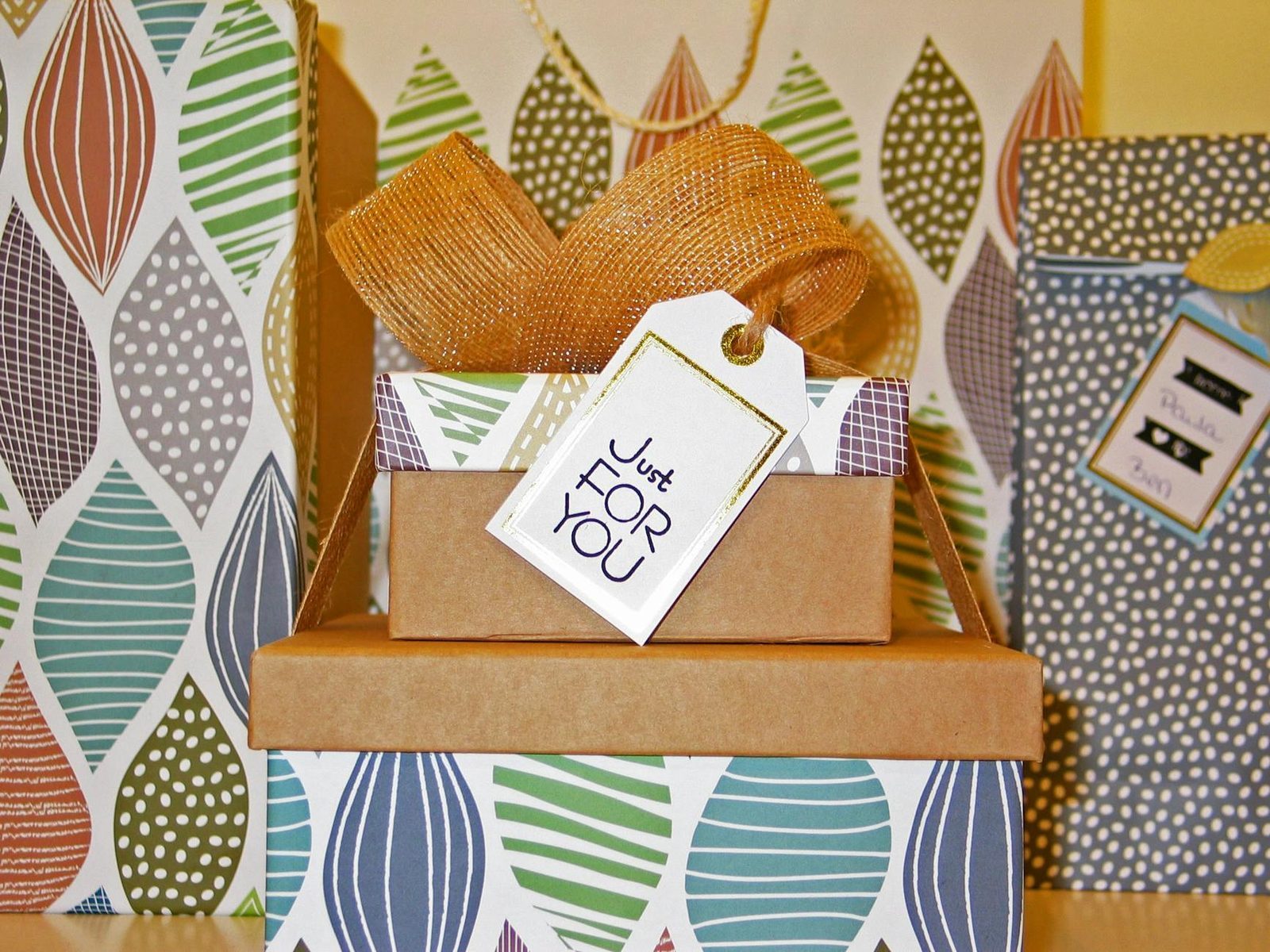 Gift packages and boxes at a doorstep, representing online tea delivery
